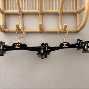 CHANEL Black Hangers with Gold Logo Clips
